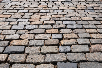 Cobblestone pavement. Abstract background image.