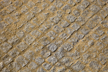 Portuguese cobblestone pavement in granite, just built.