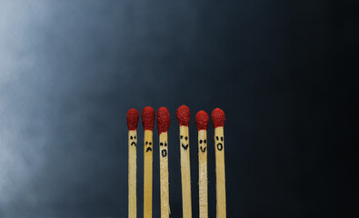 Group of a red match burning isolated with the background. Row burning matchstick in the chain reaction. Matchstick art photography.