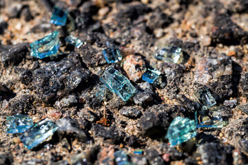 broken car glass on the new asphalt