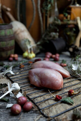  Fresh raw chicken breast with herbs and spices in the kitchen