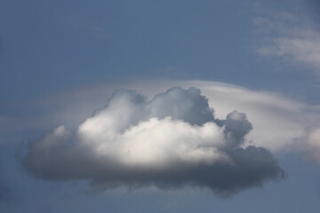 In the summer sky single small cloudlet. Thanks to original solar lighting it is painted with many paints.