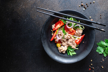 tuna salad vegetables tomato, onion, herbs, olives other canned tuna fish seafood on the table, healthy meal copy space food background top view keto or paleo diet veggie vegetarian food pescetarian 