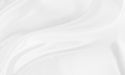 White gray satin texture that is white silver fabric silk background with beautiful soft blur pattern natural.