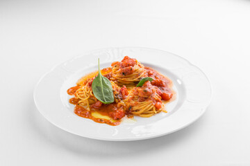 spaghetti pasta bolognese with tomato sauce isolated on white background