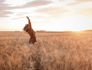 girls jumping  in the field