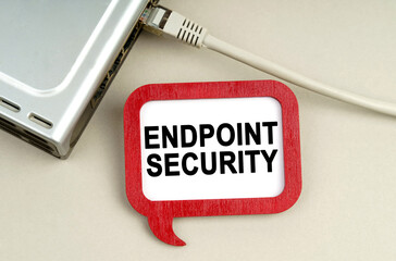 There is a router connected to the network on the table, next to a sign that says - Endpoint...