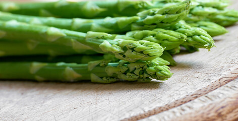 fresh green asparagus from an asparagus field as an ingredient in a kitchen