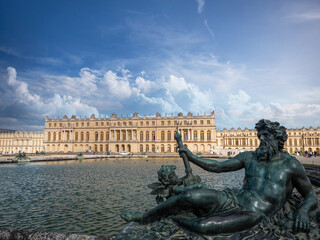 Fototapeta na wymiar VERSAILLES, FRANCE, MAY, 2021. Statue of le Rhone on the ground floor of Versailles water, each of these nymphs represents a river in France.