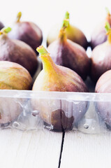 Figs in a tray, selective focus