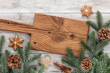 Homemade christmas gingerbread cookies on wooden table.