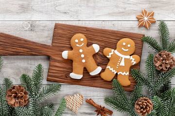 Homemade christmas gingerbread cookies on wooden table.