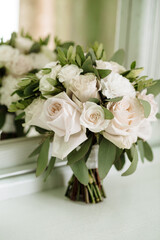 Wedding bouquet with satin and silk ribbons