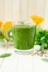 Green smoothie on the table