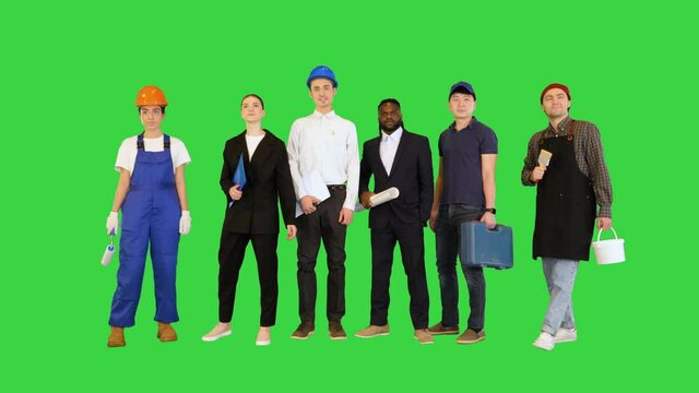 People, profession, qualification, employment and success concept on a Green Screen, Chroma Key.