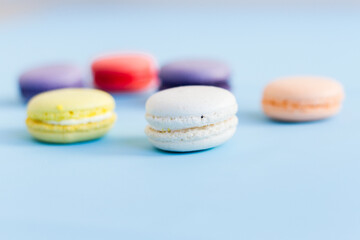 Colorful macaroons on a blue background