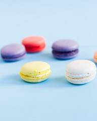 Colorful macaroons on a blue background