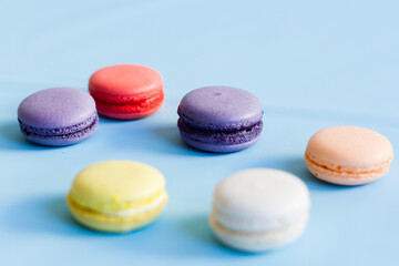 Colorful macaroons on a blue background
