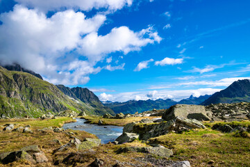 Fototapeta na wymiar sunny alpin scenery with a river (Vorarlberg, Austria)