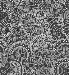 Decorative vector seamless pattern with ornamental handwritten heart and other linear curling ornaments