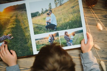 Luxury wooden photo book on natural background. Family memories photobook. Save your summer...