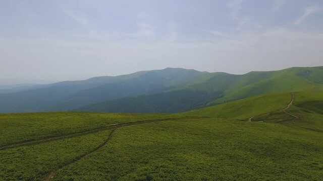 View on the Carpathian mountains range Borzhava, panoramic motion, summer nature landscape