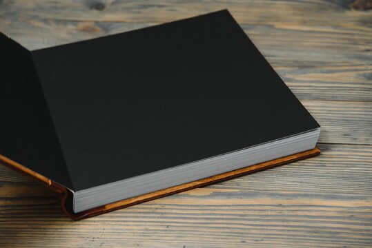 premium photo book, large size, natural wood cover, quality binding. Family photobook, recreation memories
