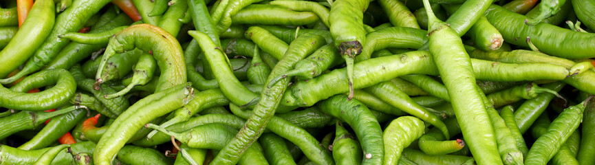 close-up of organic green peppers background