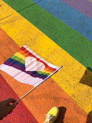 lgbtq+ pride flag and crosswalk