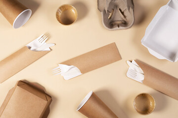 Eco-friendly paper tableware. Dishes, paper cups, fast food containers and cutlery. Recycling or environmentally friendly concept. Zero waste concept