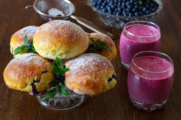 Homemade buns with blueberry filling, blueberry cocktail