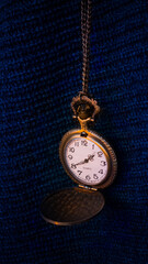 Vintage watch on blue background