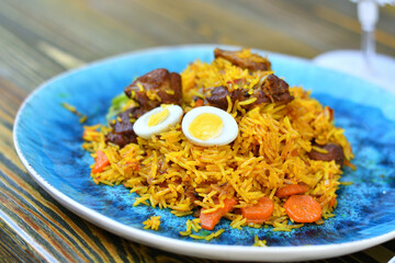fried rice with meat and boiled eggs
