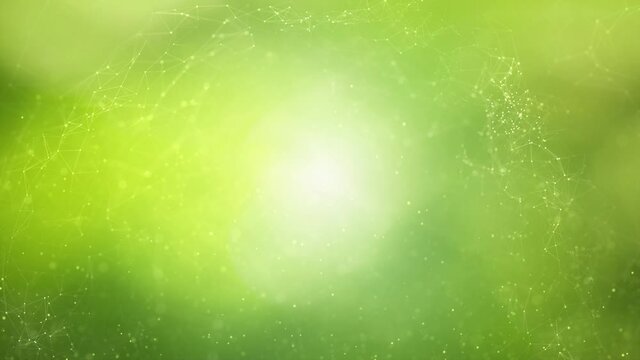 Abstract blurred green sunny nature bokeh animation with dots and lines network copy space background.