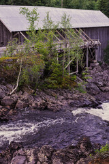 Old sawmill by the Høverelva River up in the Totenåsen Hills, Norway.