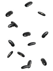 Many black beans falling on white background. Vegan diet