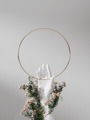 3D background round frame display, stone hand sculpture. Nature rose flower blossom. White feminine summer and spring showcase, beauty product, cosmetic promotion or text. Abstract  mockup 3D render