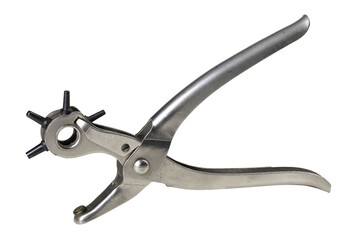 Device for making holes in a leather belt. Tools used in a leathercraft workshop.