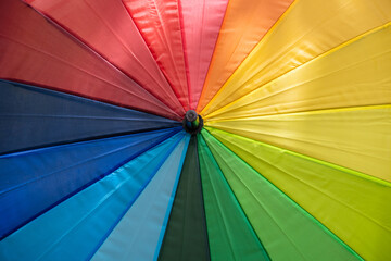umbrella in the colors of the rainbow flag at Bogota, Colombia, Sunday, July 4, 2021 during gay pride.
