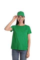 Young happy woman in green cap and tshirt on white background. Mockup for design
