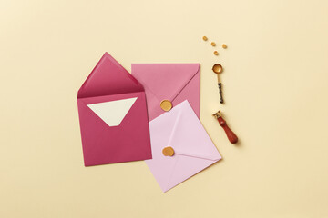 Pink envelopes for love letters and handle stamp