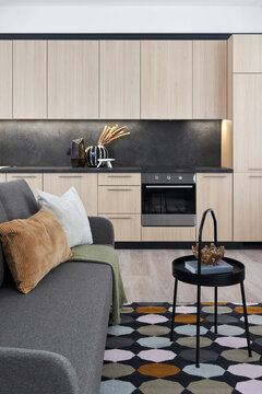 Sofa and table near kitchen