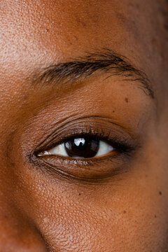 Close Up Of Woman With Dark Eyes And Dark Skin