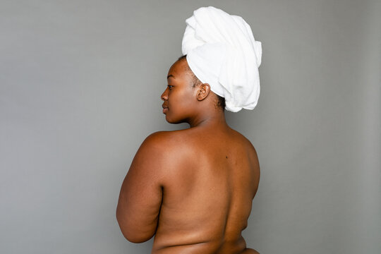 Topless Black Woman With Bath Towel On Her Head
