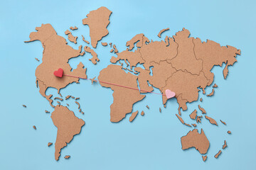 Plane miniature between hearts on map