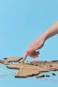 Woman pointing on map