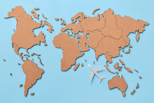 Fototapeta White plane model on world map