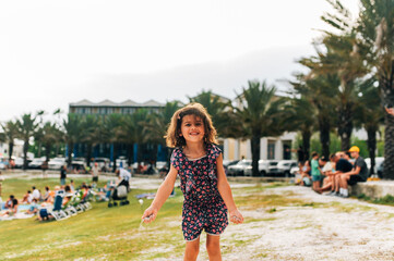 Girl smiling mischievously. 