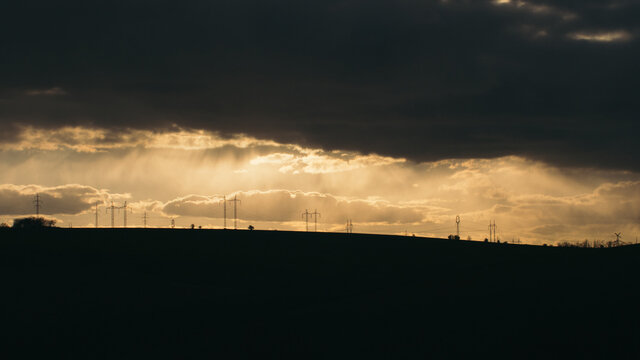 Sunset above electric power line