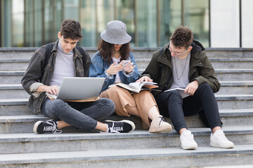 Students Studying Together Outdoors